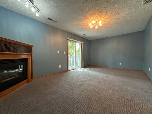 Building Photo - Sophisticated Townhome Living with Modern ...