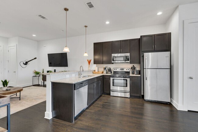 Building Photo - Furnished West End Luxury Condo