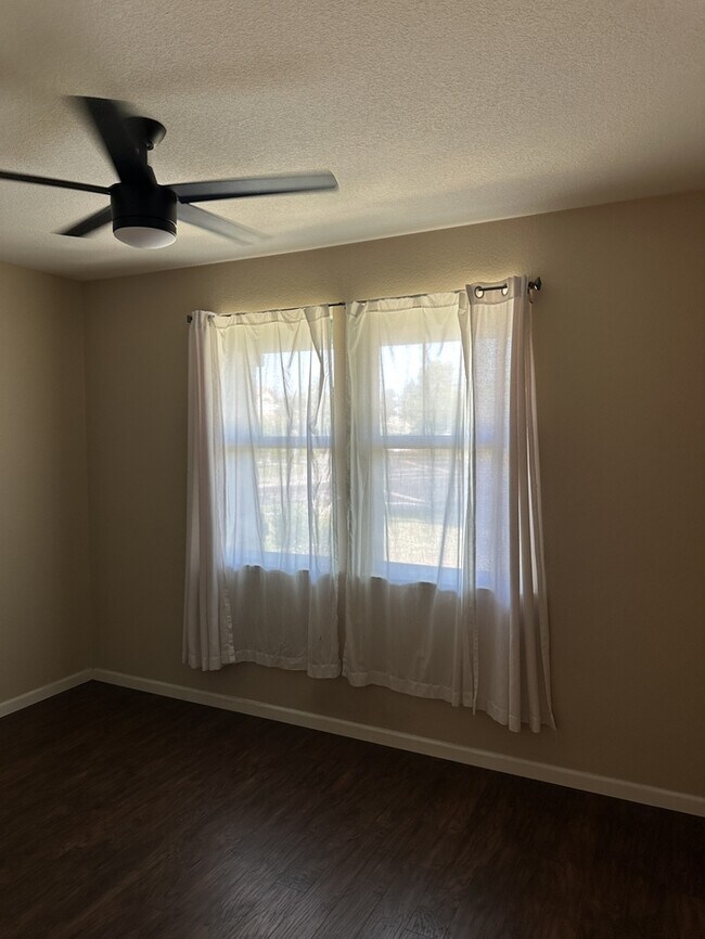 Building Photo - This stunning corner home offers 4 spaciou...