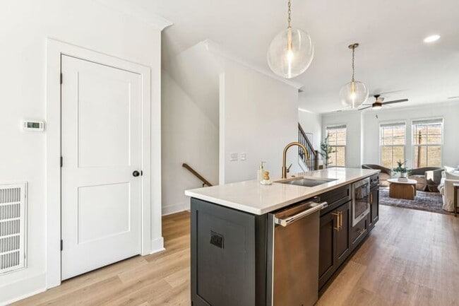 Building Photo - High-End 2BR Townhome | Rooftop Terrace + 2-Car Garage | 24-Unit Community