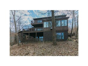 Building Photo - 4 bedroom rustic home, private acreage