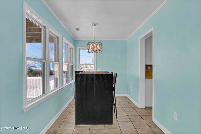 Building Photo - 1207 N Topsail Dr