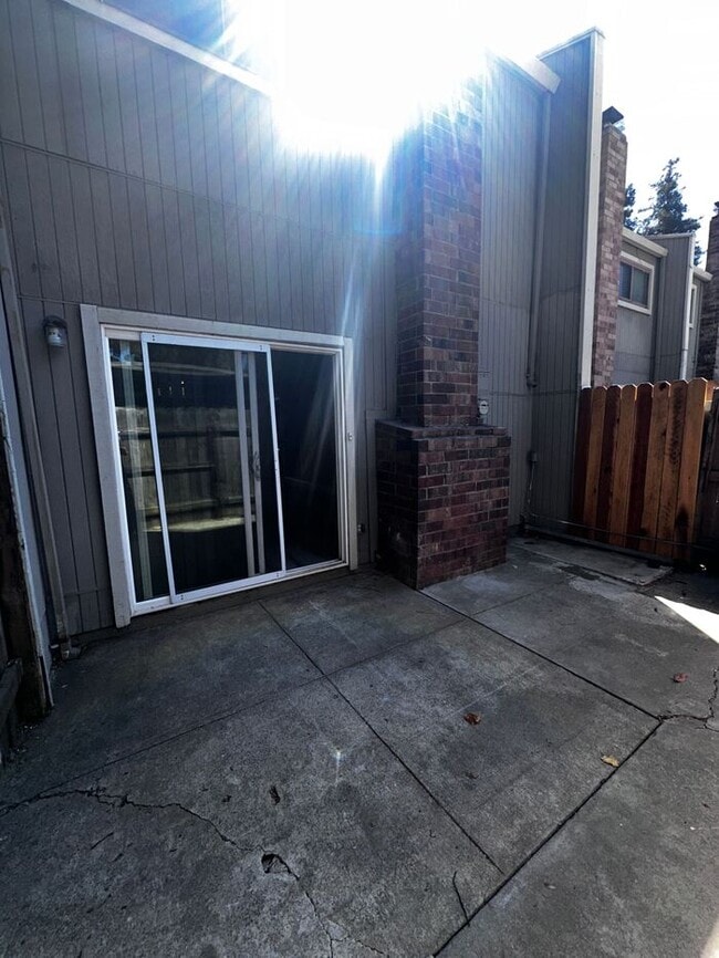 Building Photo - Charming 2-Bedroom Condo with Fireplace & ...