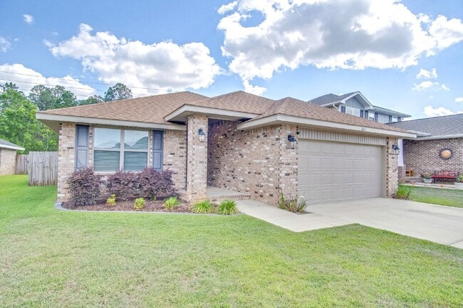 Building Photo - Spacious 4BR/2BA Brick Home with 2-Car Garage, Granite Kitchen, Vaulted Ceilings & Fully Fenced B...