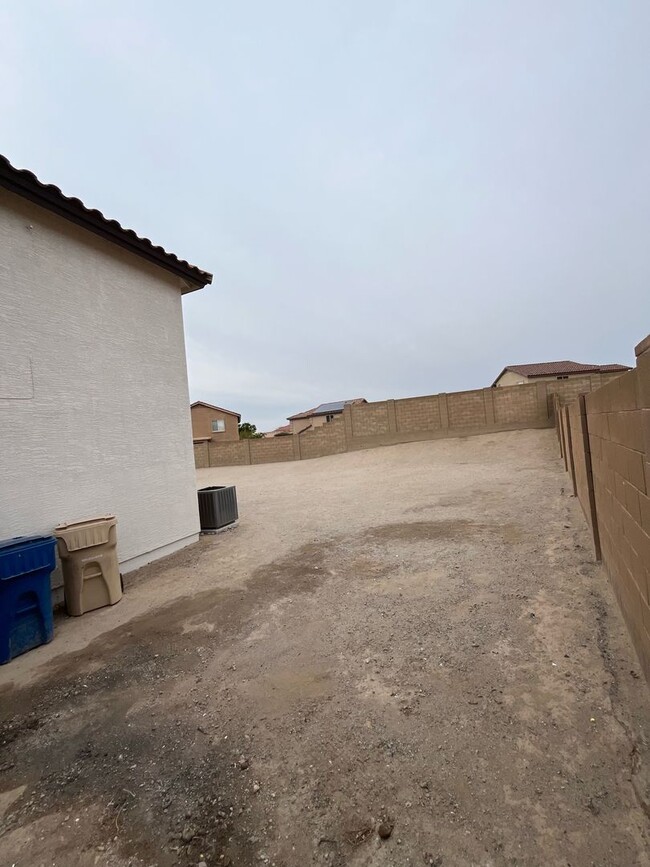Building Photo - Buckeye, 4 bed, 2.5 bath, huge lot, across...