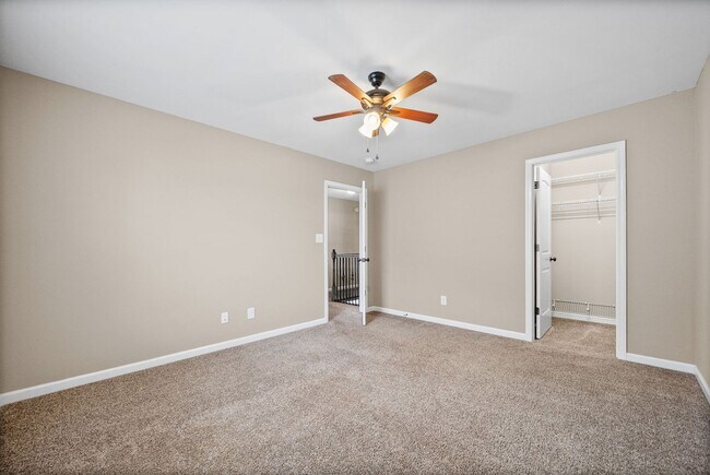 Building Photo - Four Bedroom with Three Car Garage!