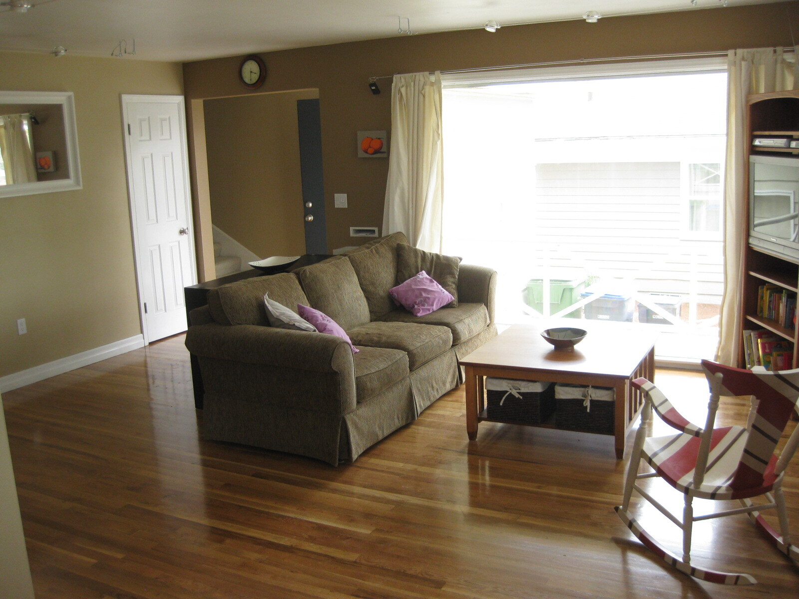 Living room with large south- and west-facing windows - 215 South 36th Avenue
