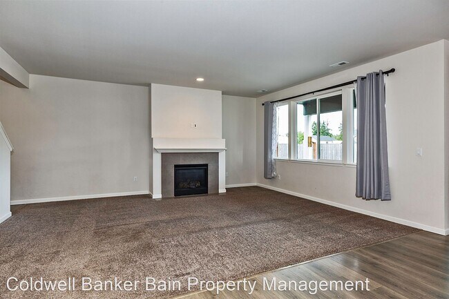 Building Photo - 4 br, 3 bath House - 14398 - 99th Way S.E.