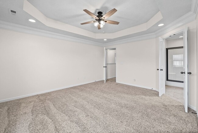 Building Photo - Pet Friendly Three Bedroom with Bonus!