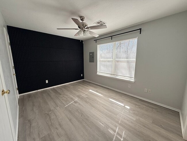 Building Photo - 4 Bedroom - 2 bath duplex located near campus and State Highway 9