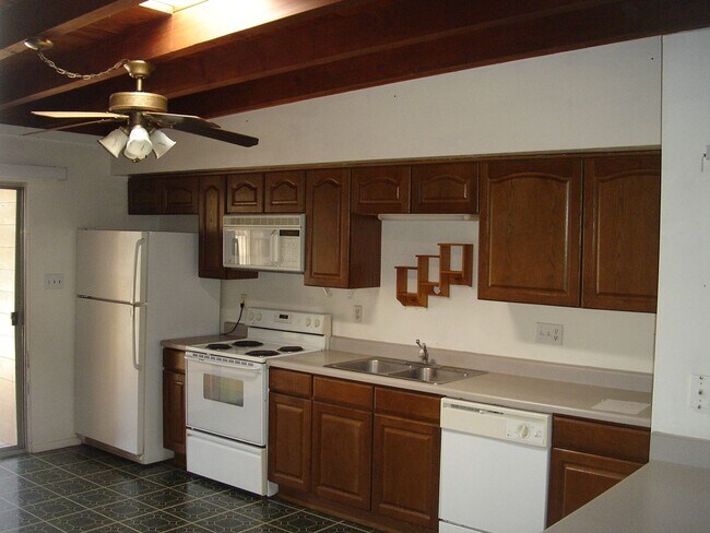 Building Photo - Available March 1, 2026. Updated 2 Bedroom 1.5 Bath Duplex with private dedicated pool.