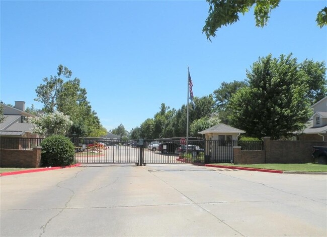 Gated entrance to Nantucket condos - 3200 W Britton Rd