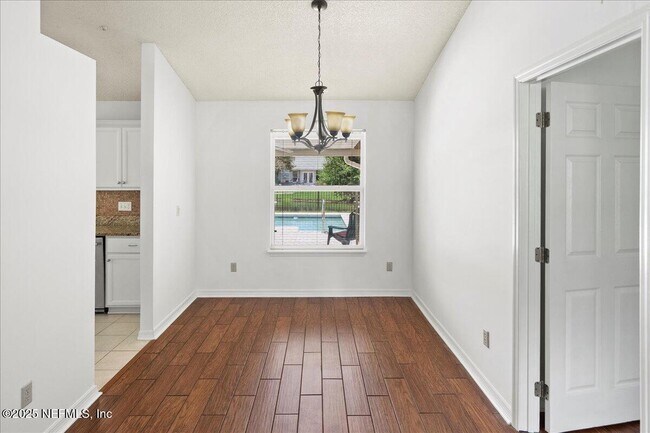 Building Photo - 10334 Triple Crown Ave