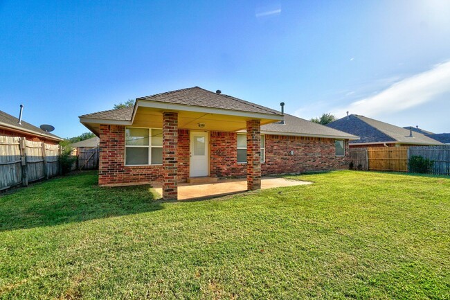 Building Photo - Spacious 4-Bedroom Home with Corner Firepl...