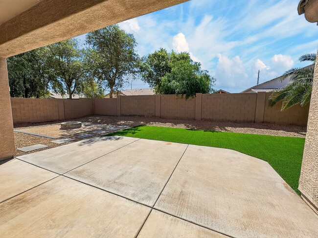 Building Photo - Single-level 4 bed, 2 bath home with tandem 3-car garage and RV gate.
