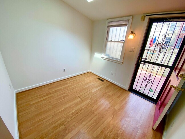 Building Photo - Charming 1BR with 1.5 Baths and Bonus Basement Room in the Heart of Ridgley’s Delight