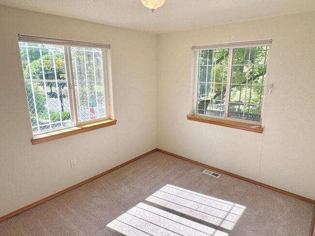 Building Photo - Montavilla Polished 2-Story with Hardwoods, Whole House A/C, Attached Garage, Off-street Parking