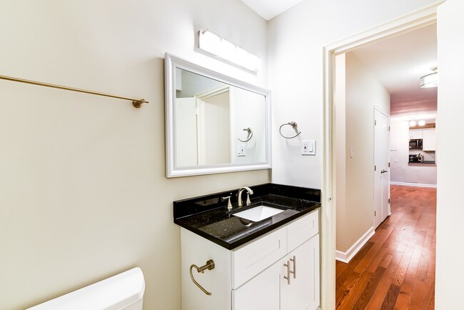Building Photo - Spacious 2 Bedroom, 2 bath condo. Enjoy be...