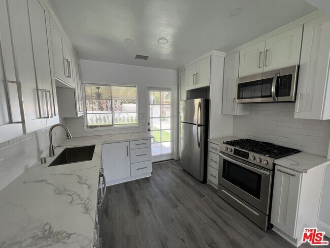 Building Photo - 5835 Shoshone Ave