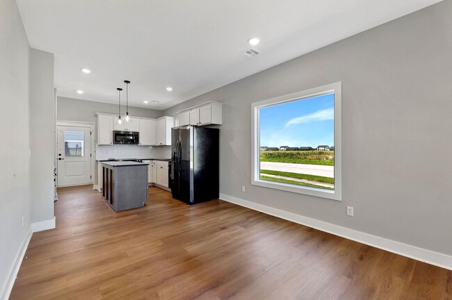 Building Photo - Modern 3-Bed Ranch in Maize – Zero-Entry L...