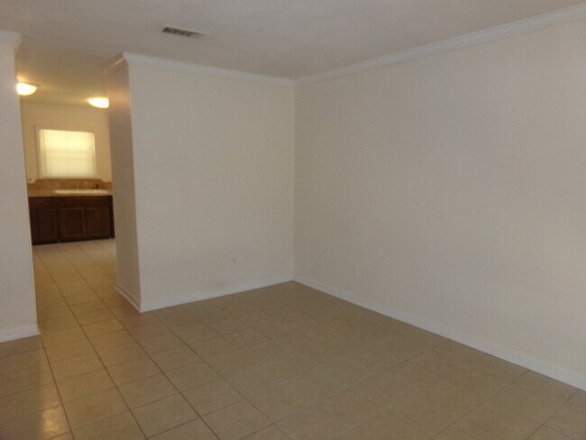 Building Photo - 2BR/1BA Milton Duplex with Huge Fenced Backyard, Tile Flooring Throughout & Convenient Access to ...