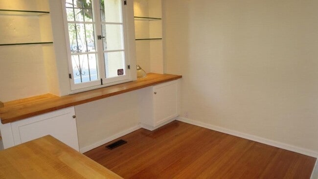 Breakfast Room with Built-In Glass Shelves and Custom Butcherblock Countertops - 1103 S Crescent Heights Blvd