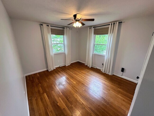 Building Photo - AVAILABLE NOW! Spacious 4 BR, 2 Bath House! Wood Floors, Attached Garage, W/D Included