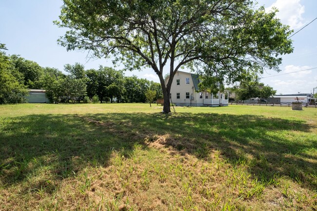 Primary Photo - Charming 4-Bedroom, 2-Bathroom Farmhouse i...