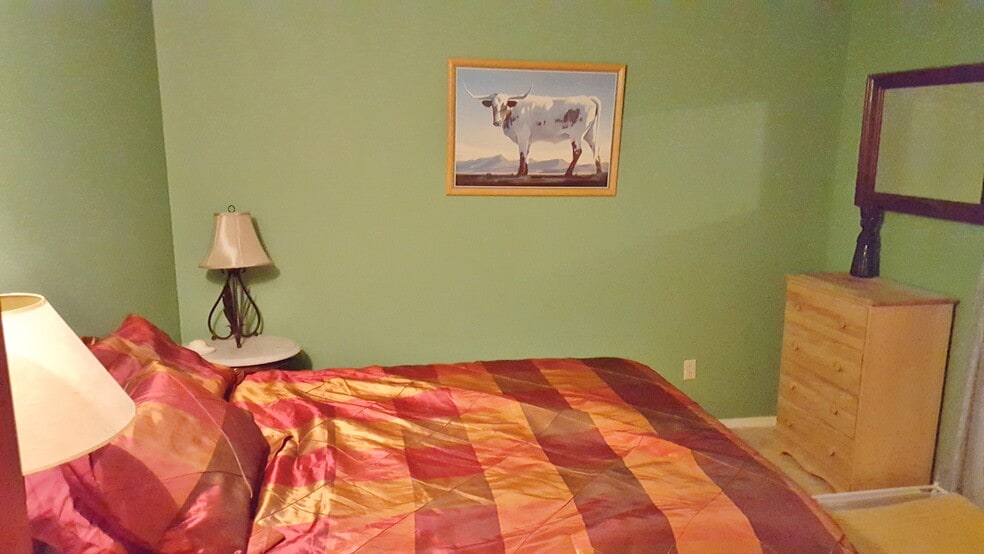 This is the downstairs bedroom. - 6436 Saint Josephs Ave NW