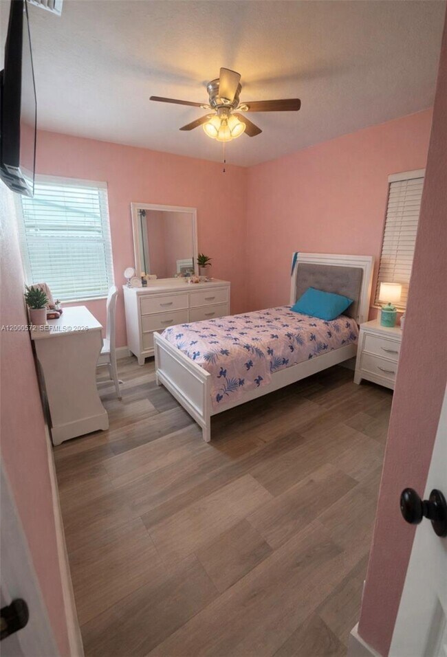 Building Photo - 6497 W 8th Ln