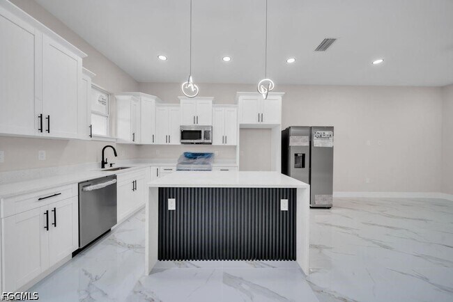 Building Photo - 4648-4650-4650 Leonard Blvd S