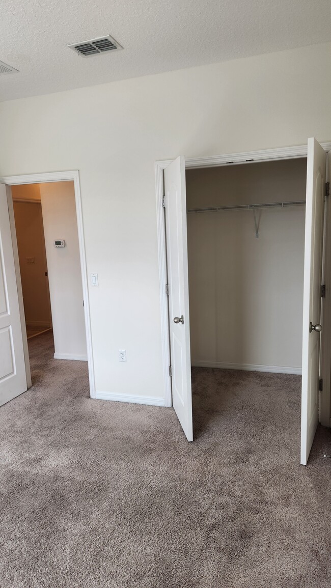 Bedroom with spacious closet - 233 Tarracina Way