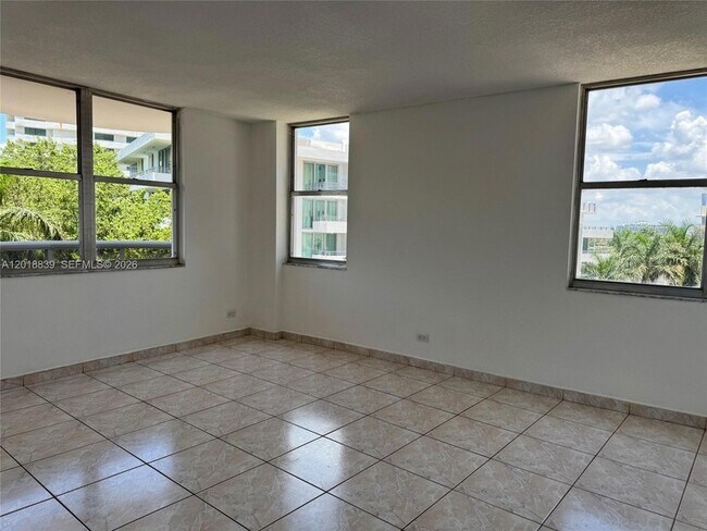 Building Photo - 6039 Collins Ave