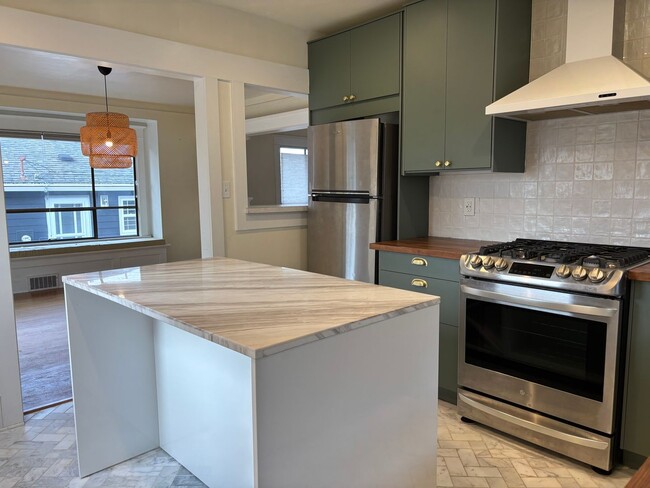 Building Photo - Timeless Charm Meets Thoughtful Updates in This Light-Filled Retreat