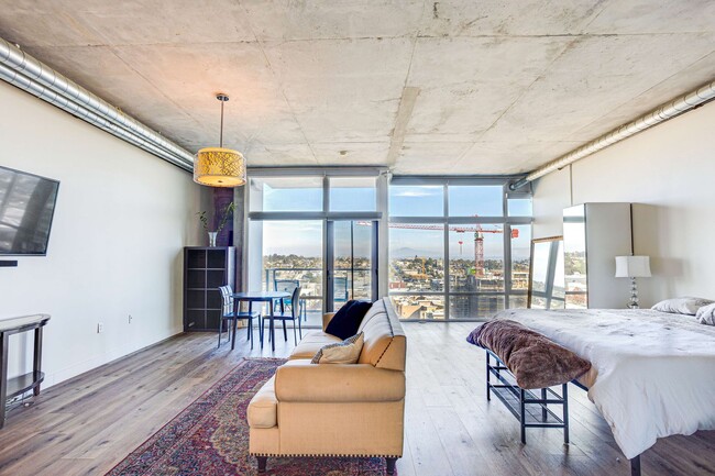 Building Photo - Stunning 16th-Floor Smart Corner Loft with...