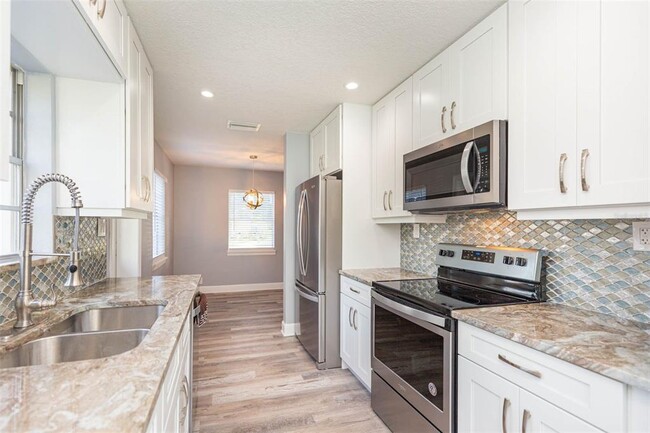 Building Photo - 3911 W Tyson Ave