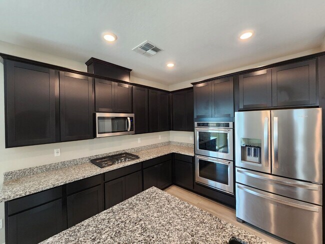 Building Photo - Upgraded 3-Bedroom with a Pool in a Gated Community