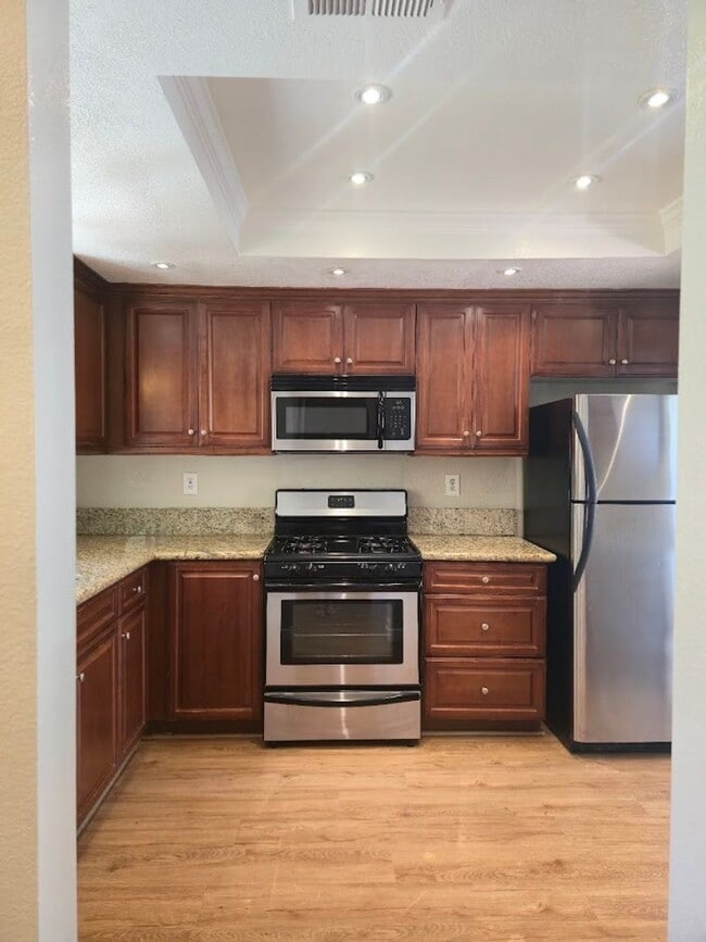 Building Photo - Light-Filled End Unit Condo, 2BD/2.5BA wit...