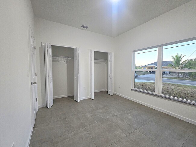 Building Photo - 2/2/1-Great Location- SW Lehigh Acres