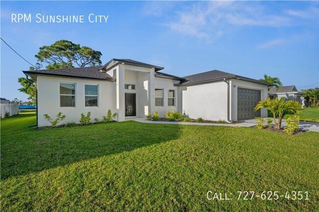 Building Photo - Modern 4-Bedroom Home in Cape Coral – Styl...