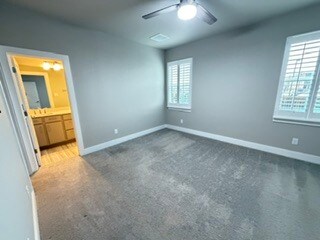 Wood shutters in master bedroom - 521 Peace Dr