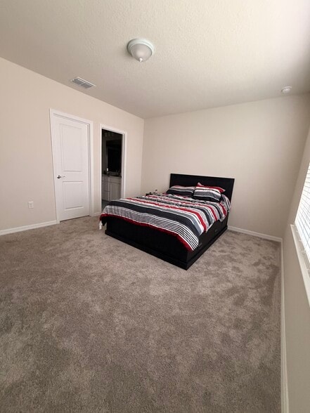 Master includes spacious walk in closet. - 3438 Orange Rose Loop