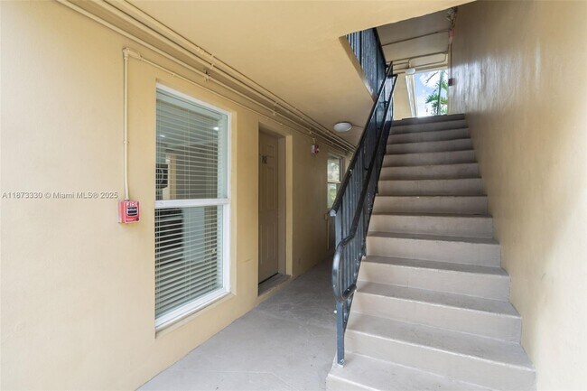 Building Photo - 241 S Royal Poinciana Blvd