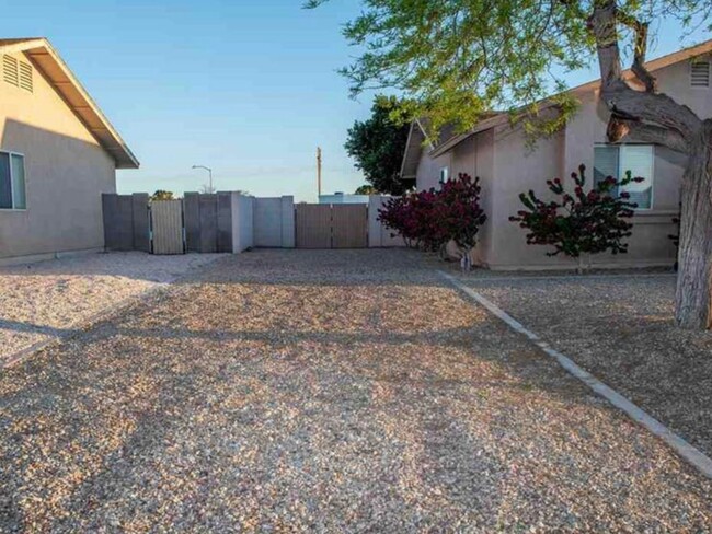 Building Photo - Four Bedroom SOLAR Home in Mesa Del Sol!