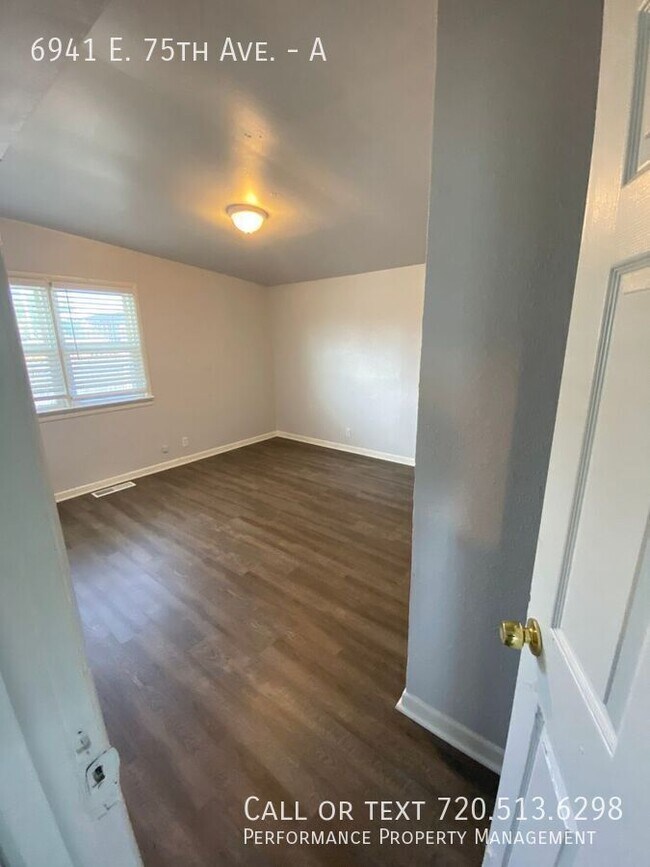 Building Photo - 6941 E 75th Ave