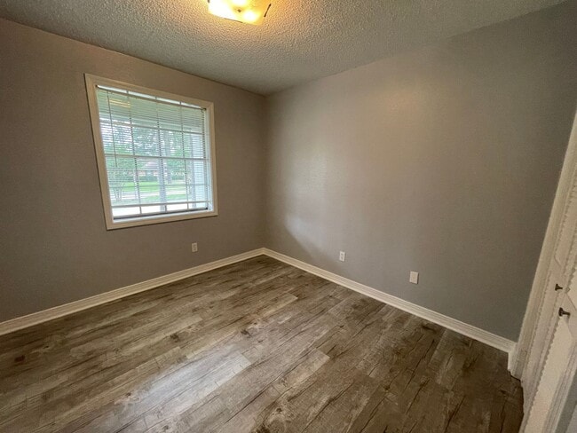 Building Photo - Lovely Two-Story Brick Home Located In "Western Hills" Off Pines Road