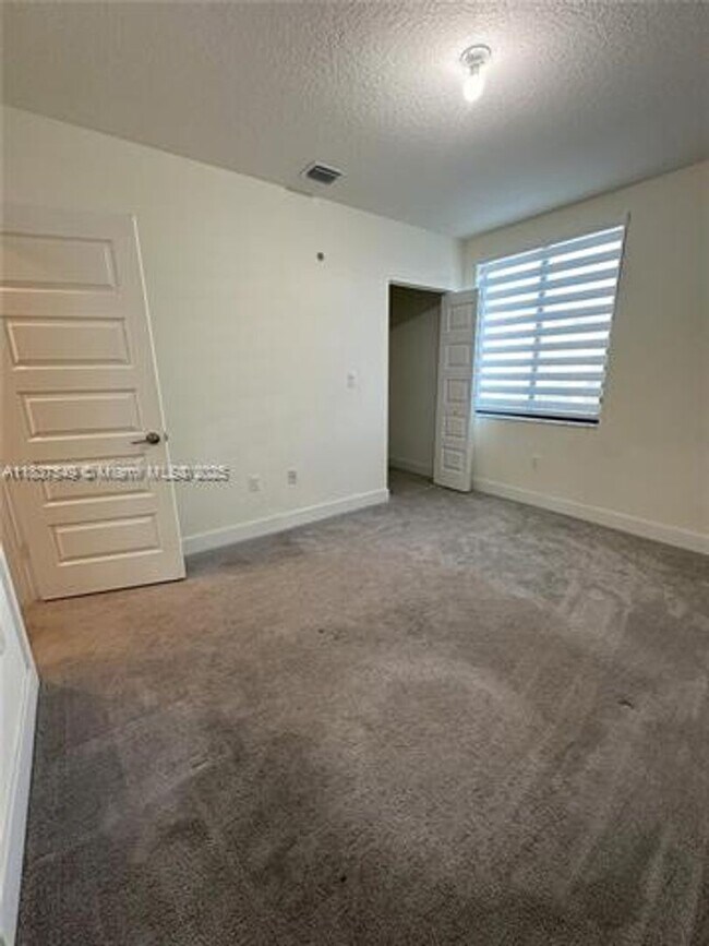 Building Photo - 4670 NW 84th Ave