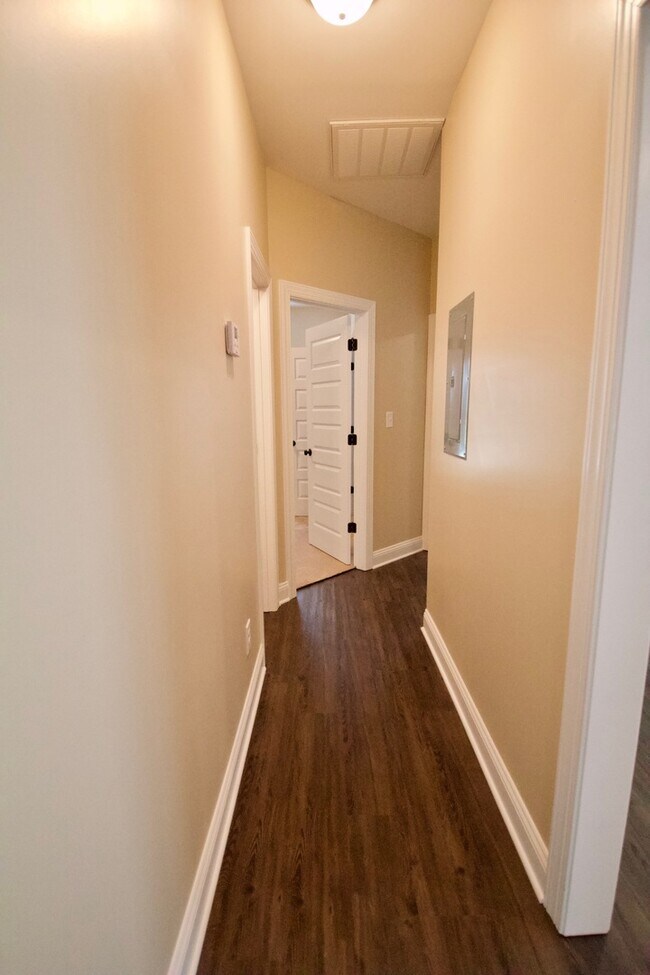 Building Photo - "Brand New Construction."  Quiet location, charming, cozy 3 bedroom duplex