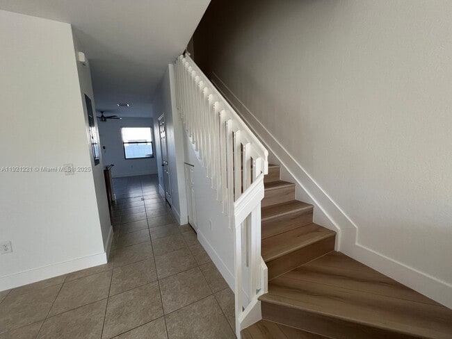 Building Photo - 9399 W 33rd Ln