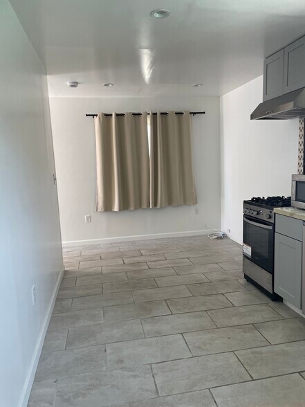 Dining/Living area - 300 S La Peer Dr